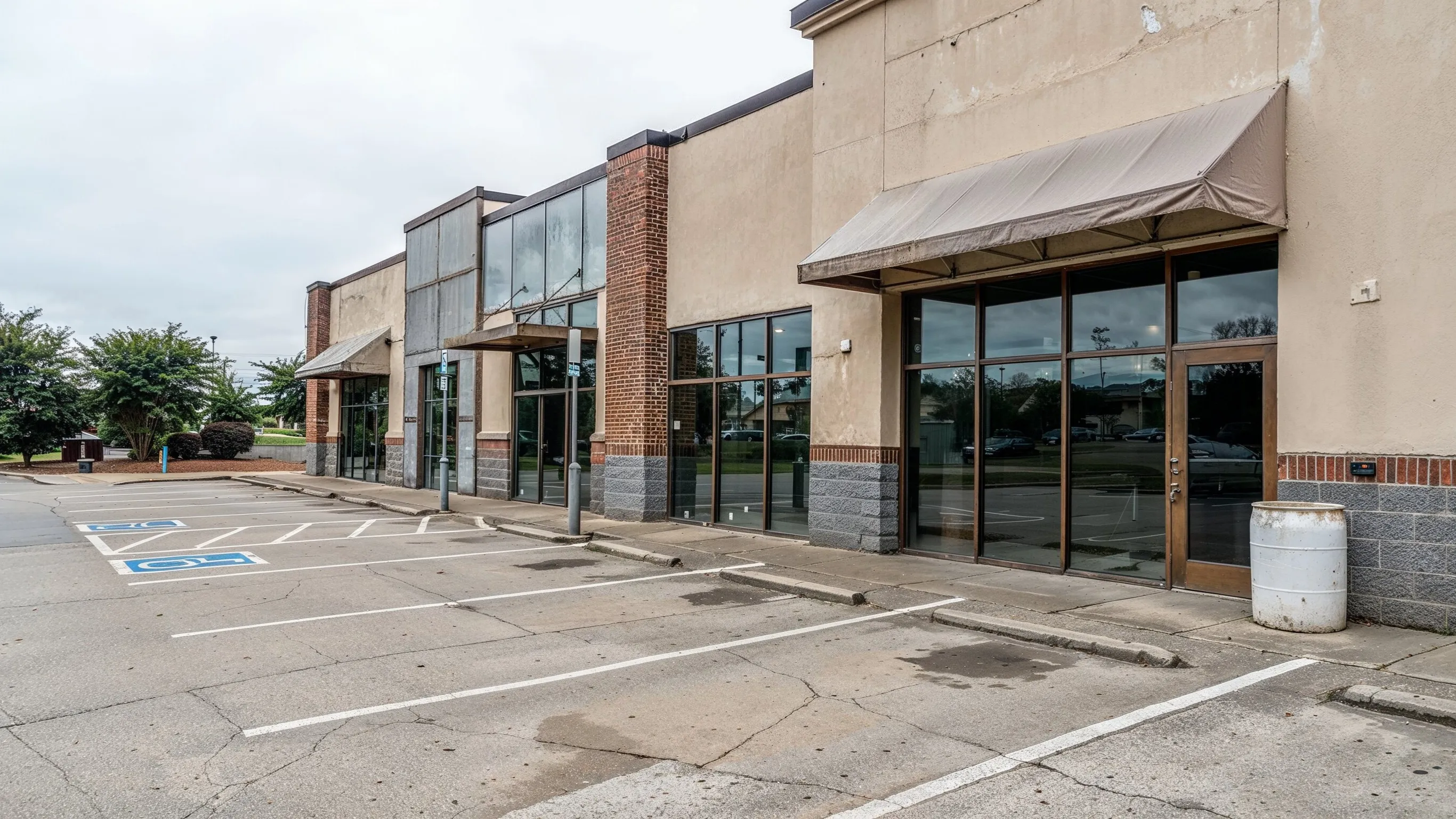 Before commercial remodeling project in Los Angeles showing an older storefront exterior before facade updates, entry improvements, and business remodeling work.