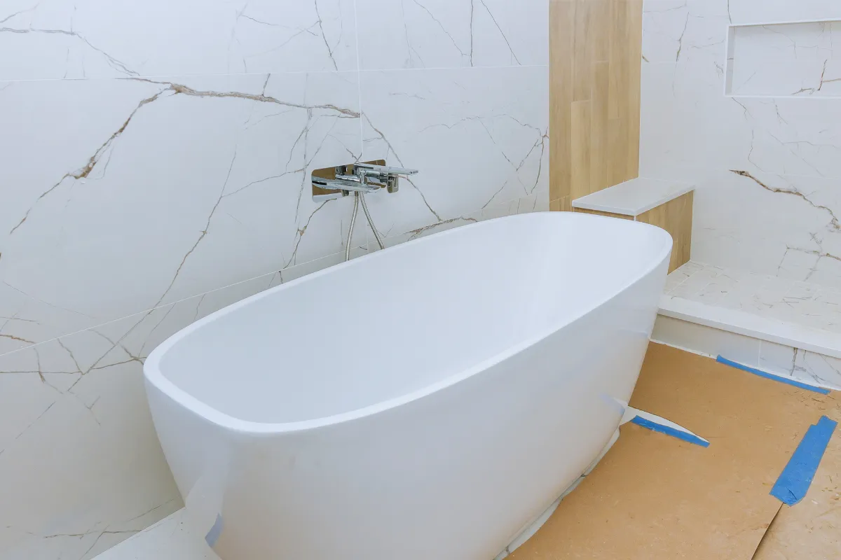Bathroom remodeling service in Los Angeles with modern fixtures, tile, vanity, and improved layout